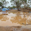 A scene inside the Menik Farm camp, Sri Lanka, on 16 August 2009 following heavy rains