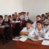 An overcrowded classroom at a school in Uyali village, Tajikistan,  hit by mudflows earlier in 2009