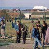 Asylum-seekers from various countries gather near the northern French port of Calais