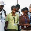 Staff members from the UN Stabilization Mission in Haiti (MINUSTAH) observe a moment of silence for their fallen colleagues during a memorial service in Port-au-Prince, Haiti.