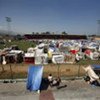 Haitians set up temporary shelters in Port-au-Prince stadium