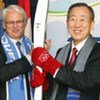 Secretary-General Ban Ki-moon holds Olympic Torch at UN Headquarters event dedicated to Olympic Truce in October 2009