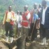 Uganda Red Cross volunteers survey damage wreaked by landslide that struck Bududa district