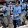 American Idol winner, Kris Allen, with a crew of Haitians working for the 'Work for Cash' programme in Carrefour, Port au Prince