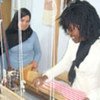 A refugee tries her hand at traditional weaving in a Moroccan women's craft cooperative