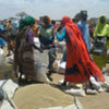 WFP distributes food in an IDP camp in North Darfur, Sudan