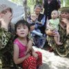 Uzbek women refugees on the Kyrgyz-Uzbek border.