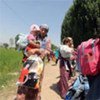 Thousands of civilians returning home to southern Kyrgyzstan from Uzbekistan despite not having any place to stay
