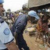 Police Officers of the UN Operation in Côte d’Ivoire patrol market area