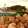 Ships docked on the coast of Aceh carrying relief supplies after the 2004 tsunami