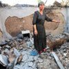 This woman who was displaced by the violence in southern Kyrgyzstan returned to find her house badly damaged