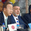 Secretary-General Ban Ki-moon (left) addresses Kabul conference. President Hamid Karzai (centre) listens