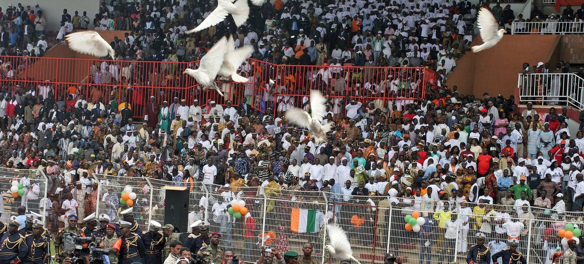 Doves are released  to mark the beginning of the disarmament and reconciliation process in Bouake, Côte d'Ivoire.