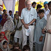 UNICEF Executive Director Anthony Lake (centre) visits a hygiene education session at a school in Charsadda district, Pakistan