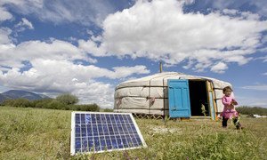 A family in Uvs Province, Mongolia, using a solar panel to generate power for their ger, a traditional Mongolian tent.