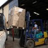 Southern Sudan Referendum equipment and materials being unloaded at Juba airport for dispatch to the ten states
