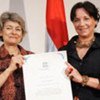 Director-General Irina Bokova (left) with new UNESCO Artist for Peace Márta Sebestyén