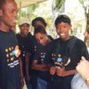UNFPA Executive Director Thoraya Obaid (right) with Haitian youth tracking malnutrition among mothers and children