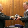 IMO Secretary-General Mitropoulos presents prize to Johan Franson (right)