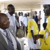 Benjamin Mkapa (left) speaks to a staff member of a referendum registration centre in Juba, South Sudan