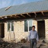 One of the new homes in southern Kyrgyzstan takes shape