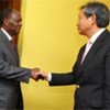 UN envoy to Côte d’Ivoire Y. J. Choi (right) with President Alassane Ouattara