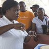 Health workers in Angola train for a door-to door polio immunization campaign