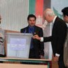 Special Representative Staffan de Mistura (second right) visits a polling centre in Kabul on 18 September 2010
