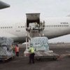 Workers unload UNHCR aid for Côte d’Ivoire’s displaced at Robertsfield International Airport in Liberia