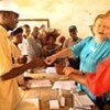 Special Representative Ellen Margrethe Løj (second right) at a voters’ registration centre in Nimba, Liberia