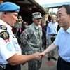 Secretary-General Ban Ki-moon greets Marc Tardif, the Acting UNPOL chief, during a visit to Haiti in 2010