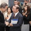 Secretary-General Ban Ki-moon greets Japanese atomic bomb survivors at opening of exhibition