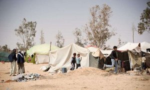 Displaced people in eastern Libya outside the town of Ajdabiya