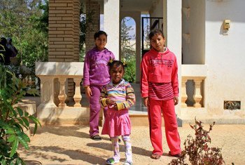 Displaced children from Ajdabiya play in the grounds of a converted construction camp in Benghazi, Libya.