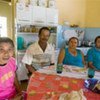 这个家庭有四口人都在巴西一家糖厂工作。联合国图片。