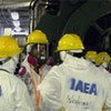 Les membres d'une équipe de l'AIEA lors d'une visite à la centrale nucléaire japonaise de Fukushima Daiichi.