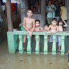 Heavy rains in June 2011 left scores of homes like this one in Cortabato City, Philippines, inundated with water