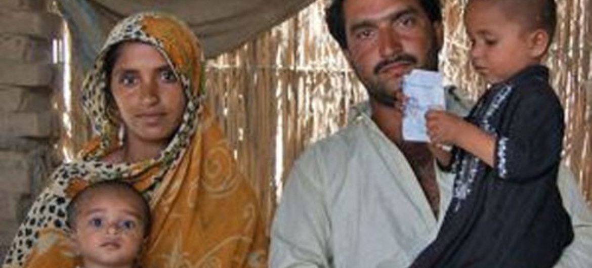 A year after monsoon floods in Pakistan, families like this one who lost their property are getting back on their feet