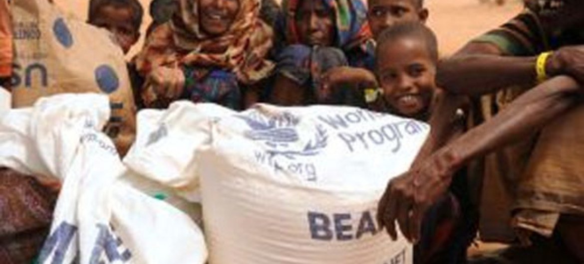 After a 25-day trek from Somalia, a family arrives at Dadaab camp in Kenya and receives a 15-day food ration from WFP