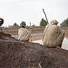 Farmers in Ethiopia observe an FAO-EU project aimed at preventing flooding during rains