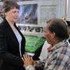 UNDP chief Helen Clark (left) speaks with a beneficiary of the agency's programme on sustainable cities in Chiapas, Mexico