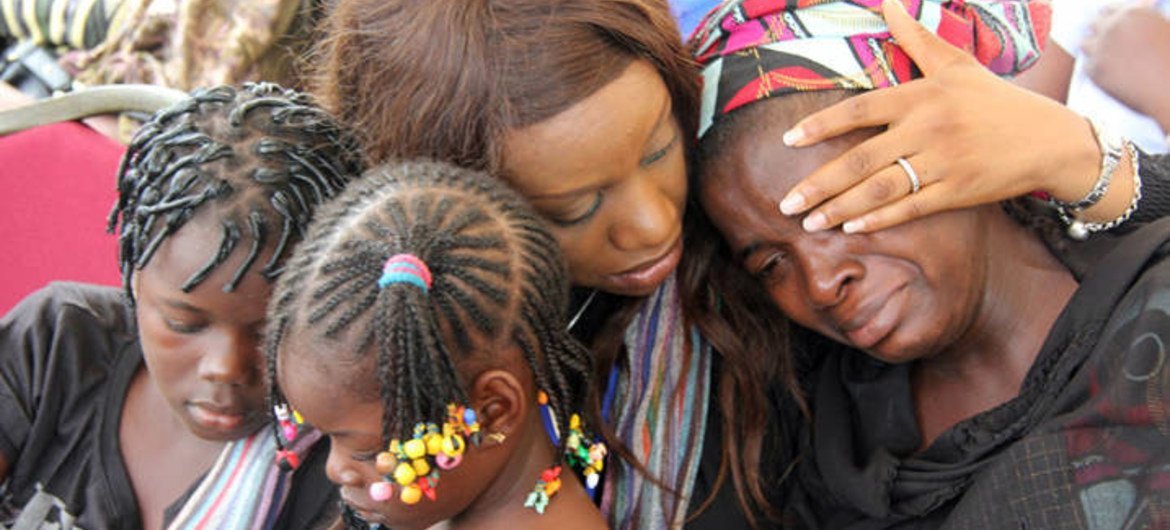 Mourners at a memorial service in honour of the victims of the 26 August 2011 attack on the UN compound in Abuja, Nigeria.