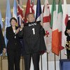 Secretary-General Ban Ki-moon displays his commemorative jersey at the launch of the 2011 Rugby World Cup