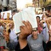 Christians and Muslims demonstrate in Cairo, Egypt, against the killing of Christian civilians in clashes with military policemen