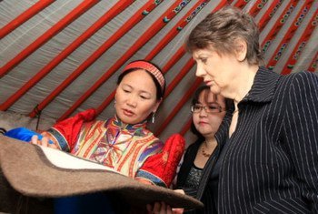 UNDP Administrator Helen Clark (right) with a felt processing entrepreneur who is part of the Enterprise Mongolia project