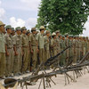 Soldiers of the Cambodia People Armed Forces (CPAF) are cantoned and demobilized as part of Phase Two of the cease-fire in 1992