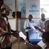UNHCR staff help prepare Angolan refugees for their return home from the Democratic Republic of the Congo.