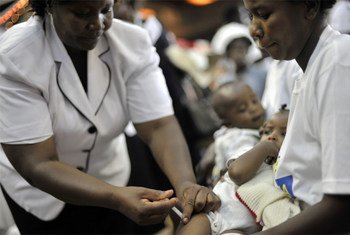 A child receives a vaccine injection in Nairobi, Kenya.