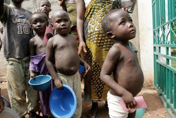 Children in line to receive a hot meal at the Catholic mission in Duékoué, western Côte d’Ivoire.