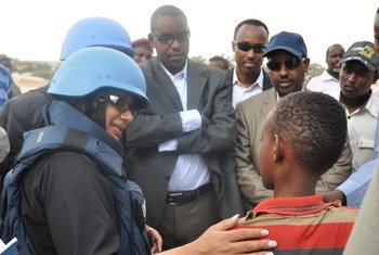 Special Representative for Children and Armed Conflict Radhika Coomaraswamy (left) speaks with child surrendered from Al-Shabaab in Mogadishu, Somalia.